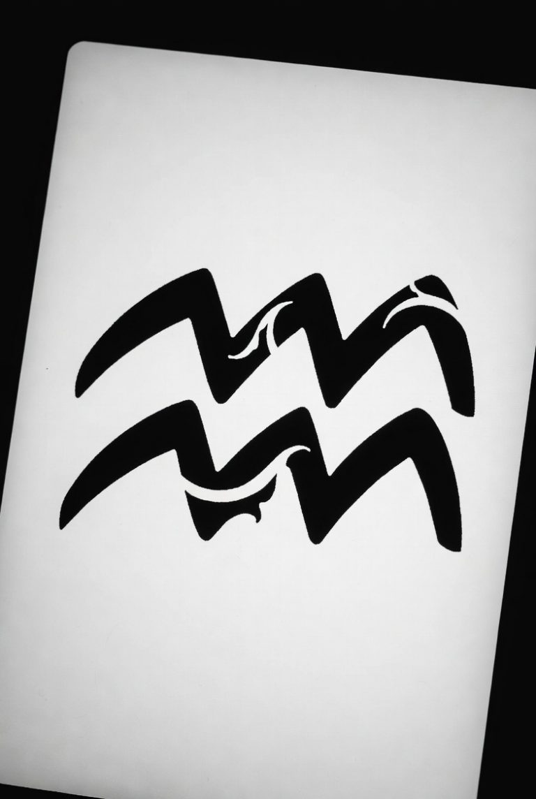 Minimalistic Aquarius tattoo example